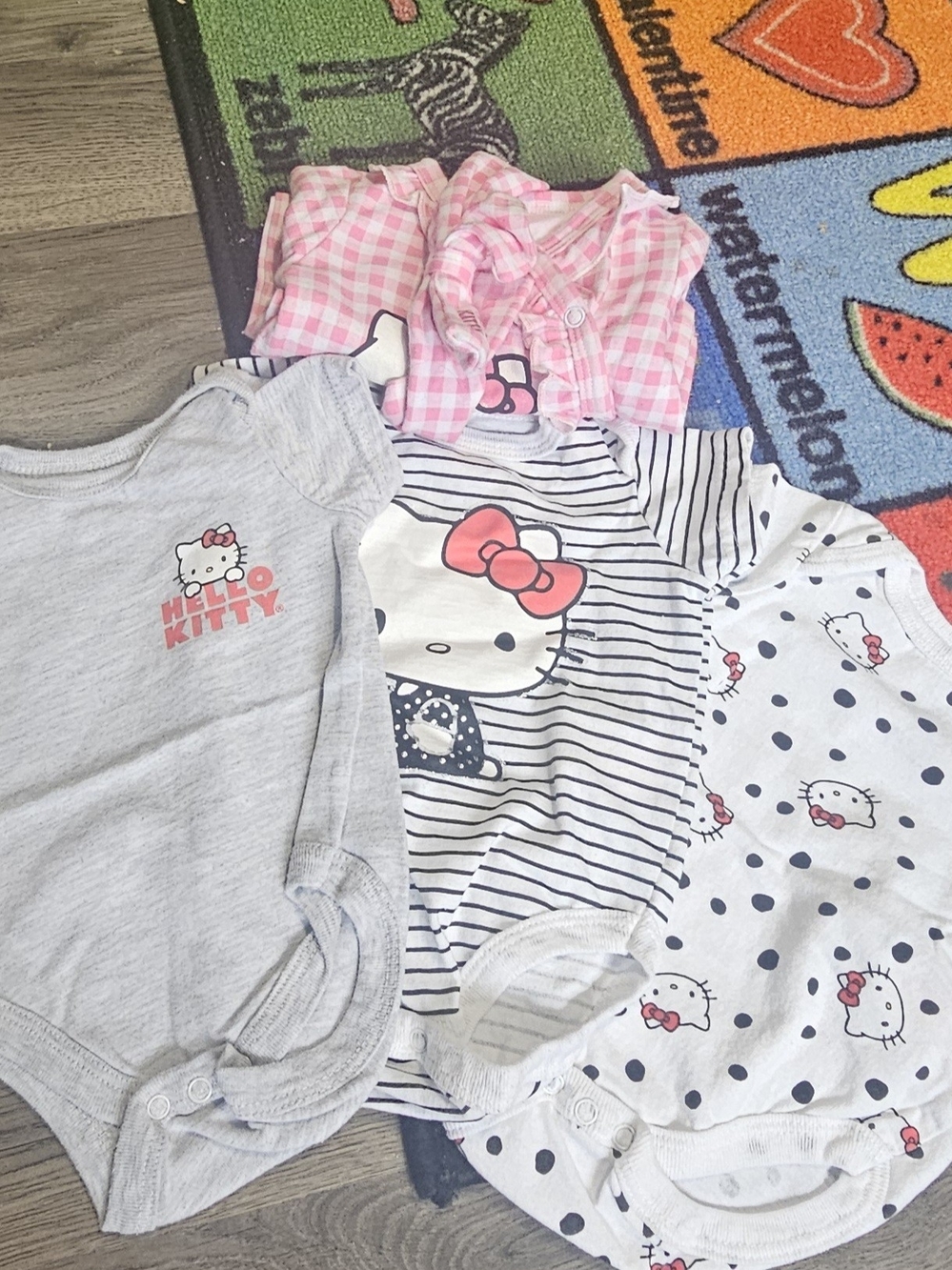 Hello Kitty Baby One-Piece Bodysuits in Pink, Gray, White and Navy